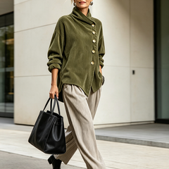 Amber corduroy button up top styled with trousers and ankle boots